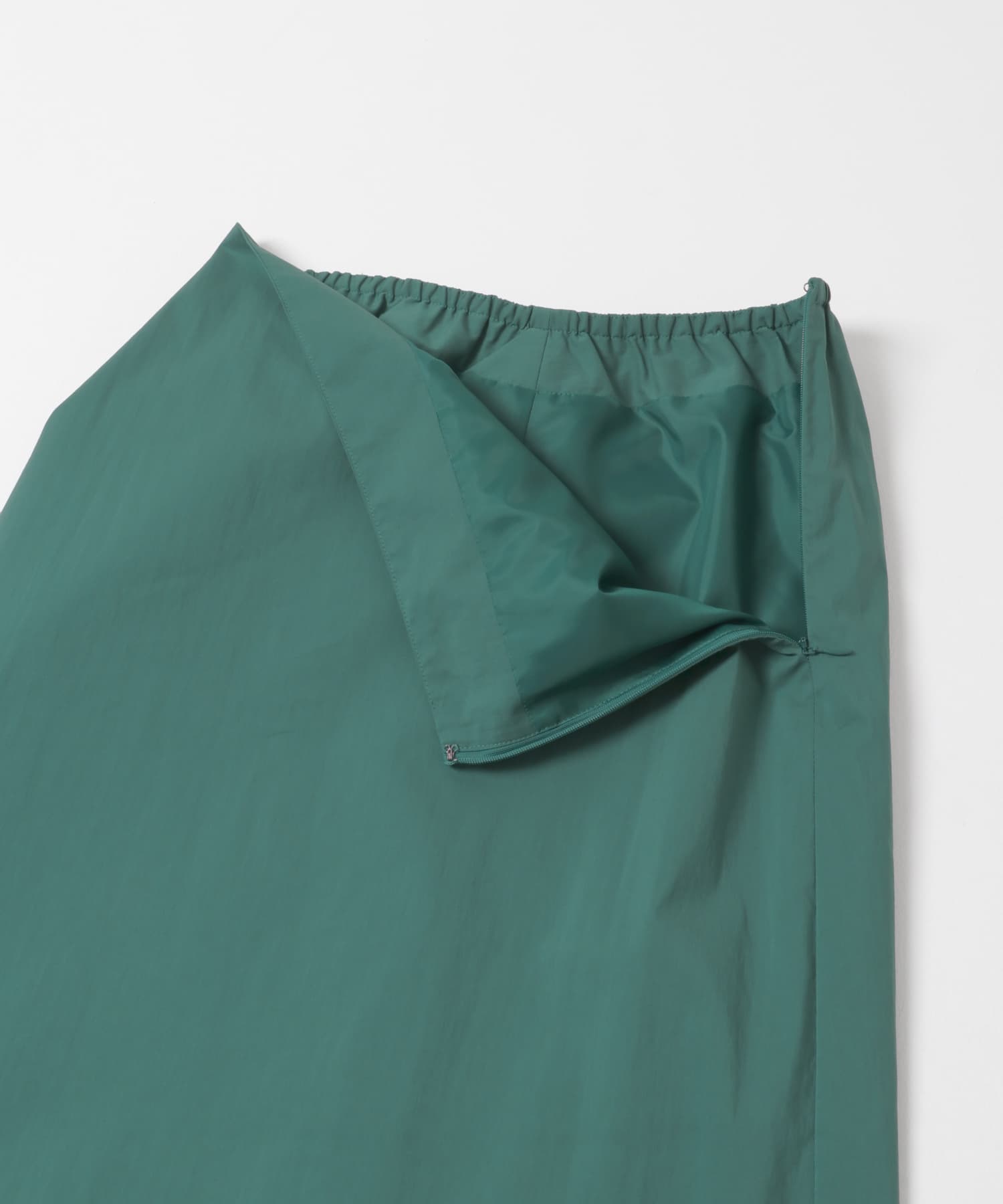 sleek long skirt クジャク Free