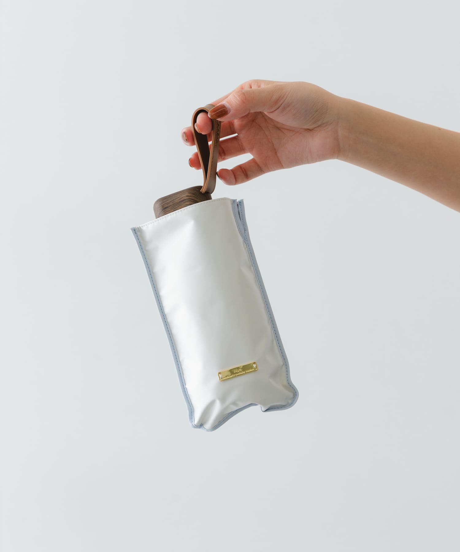 Wpc.　バイカラーパイピング日傘