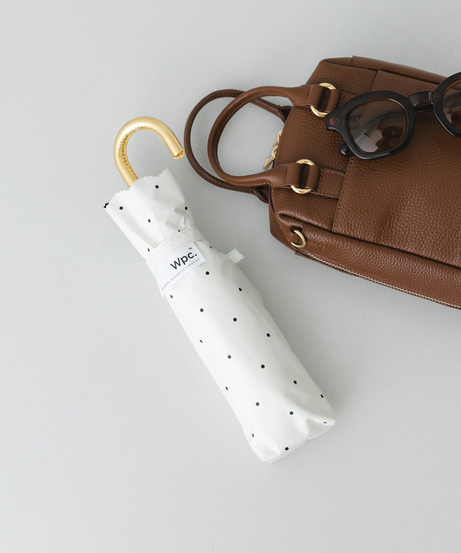 Wpc.　レースカットドット日傘