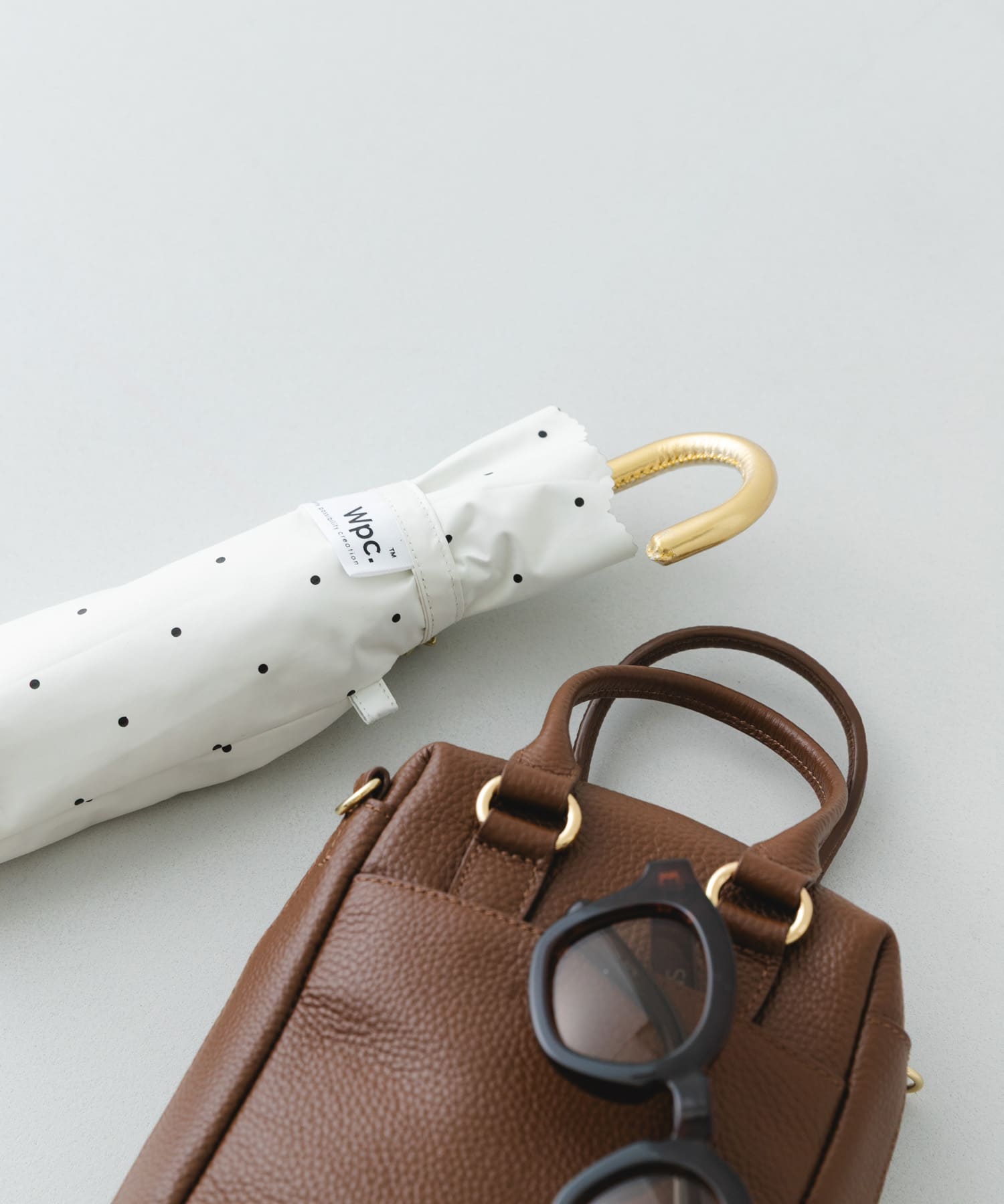 Wpc.　レースカットドット日傘 OFF One