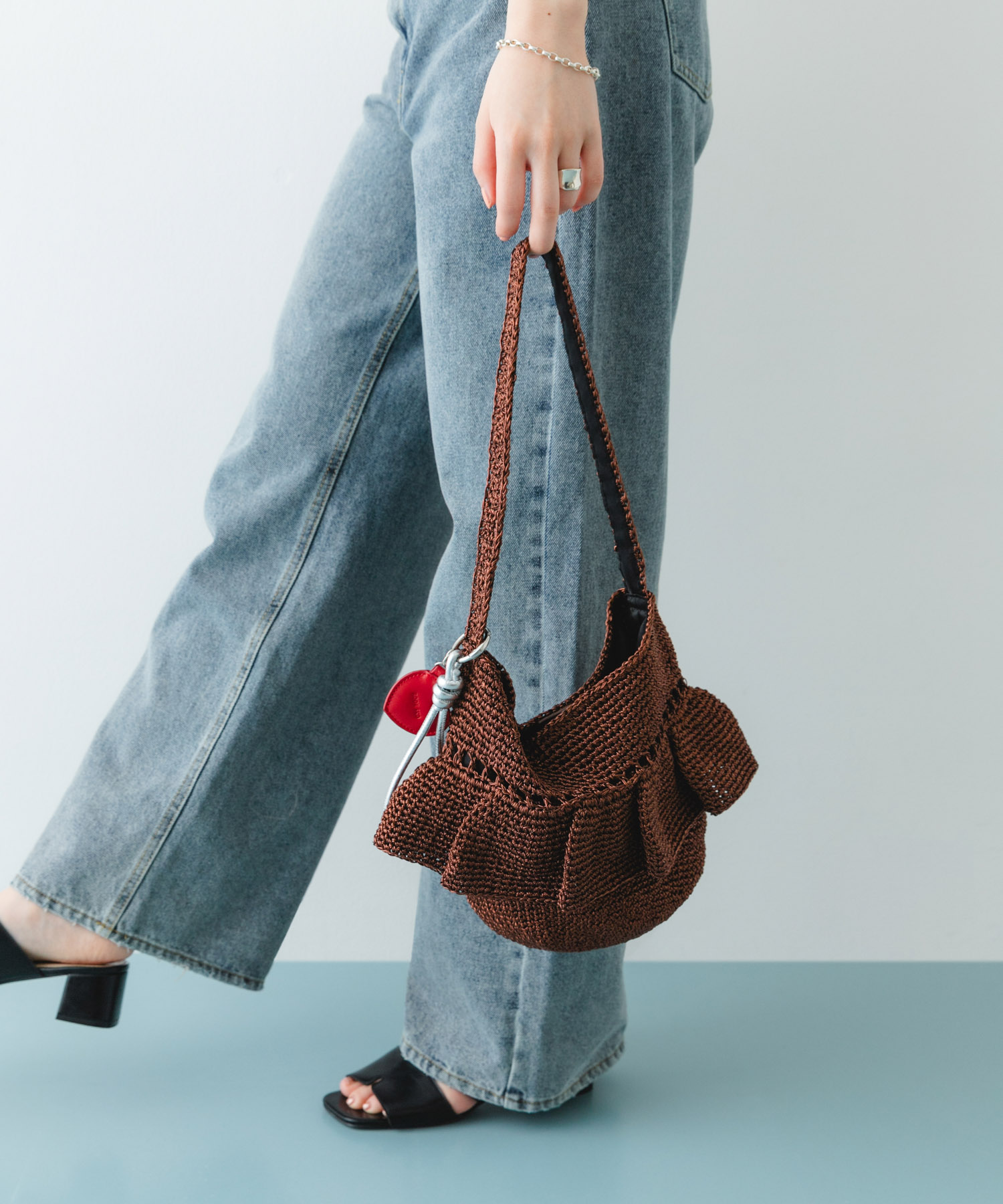 ワンハンドルフリルラメバッグ