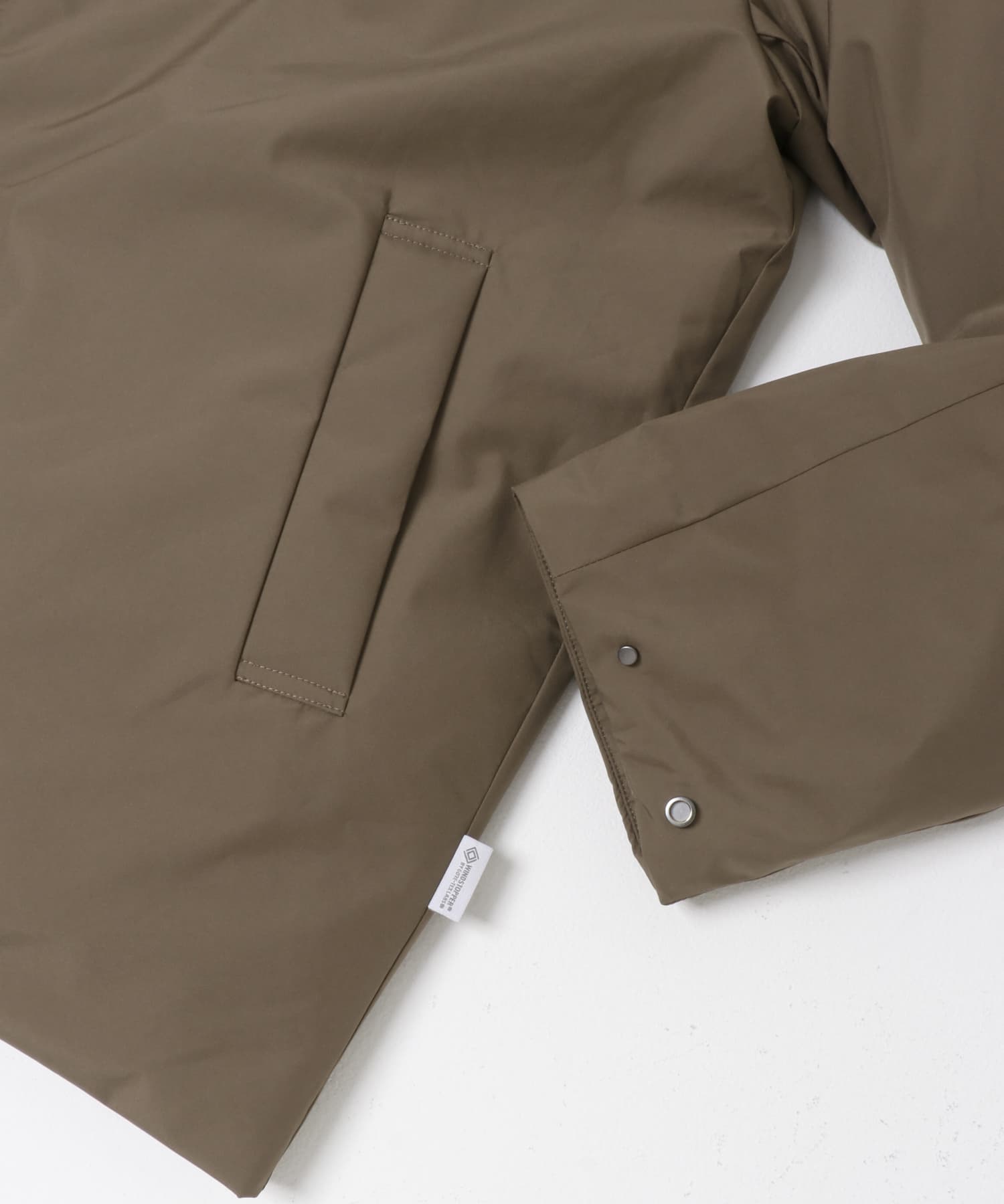 『別注』+phenix　WINDSTOPPER by GORE-TEX LABS スタンドダウンジャケット BROWN M