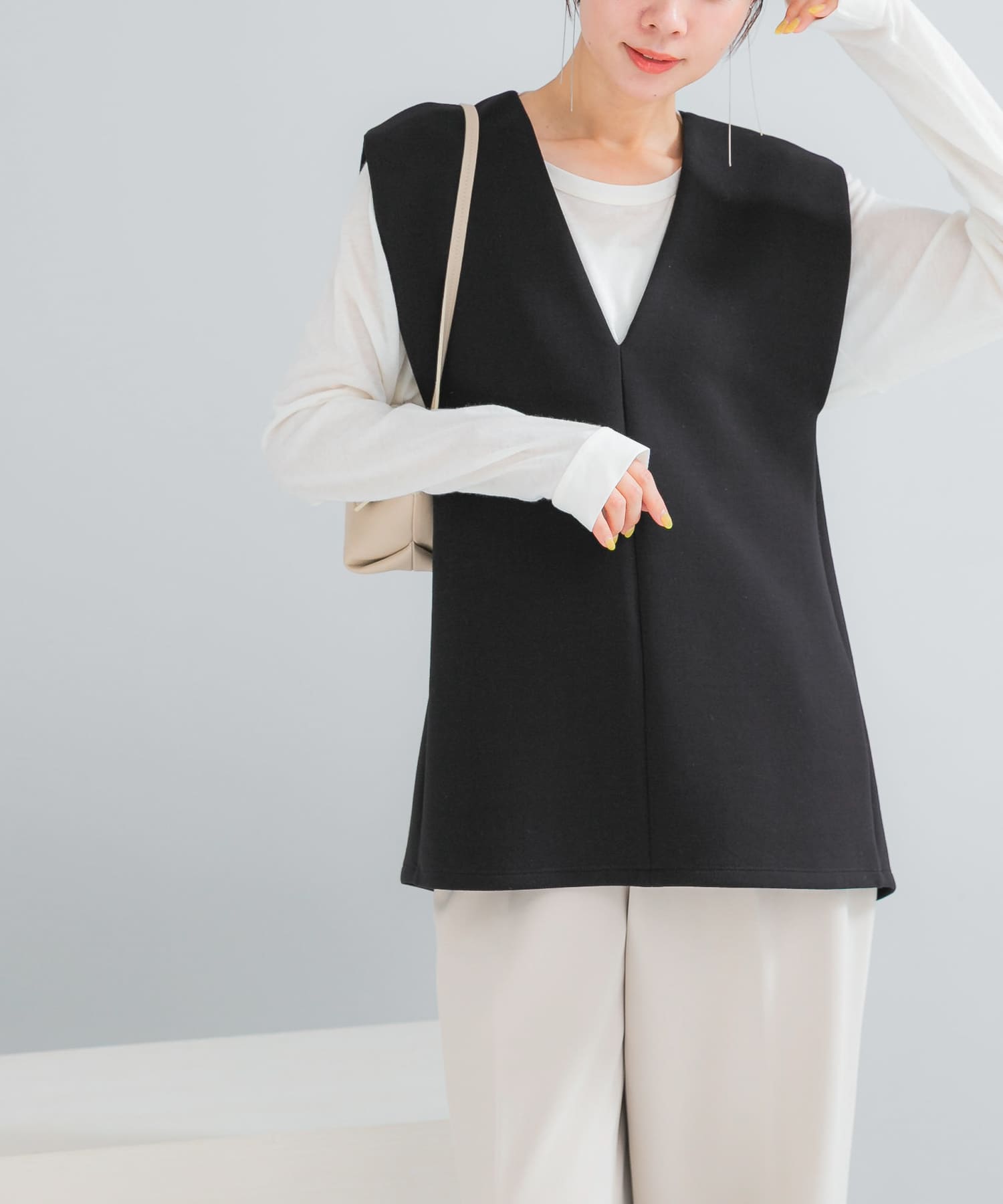 Vネックポンチベスト