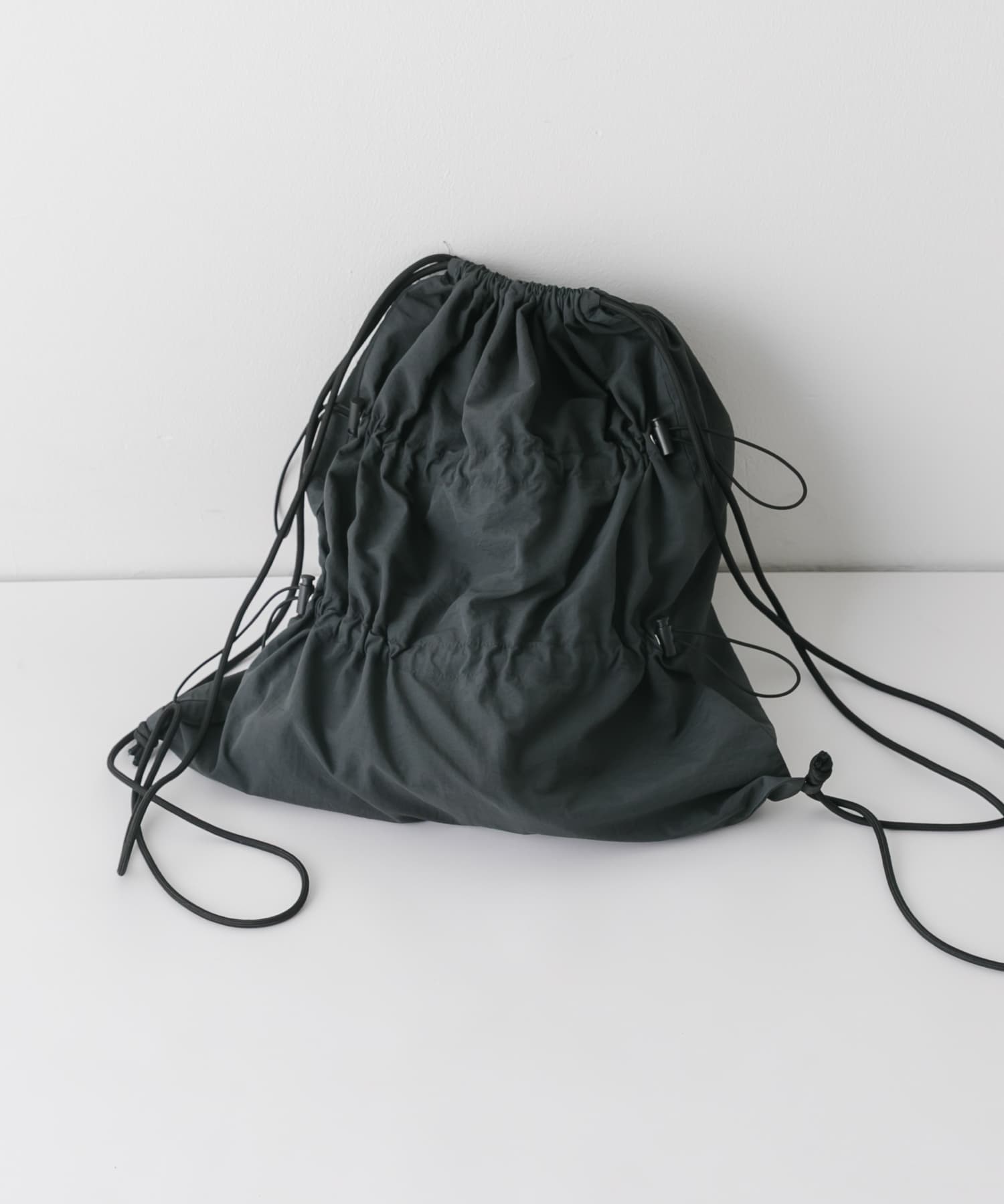 ドロストギャザーナップサック BLK -