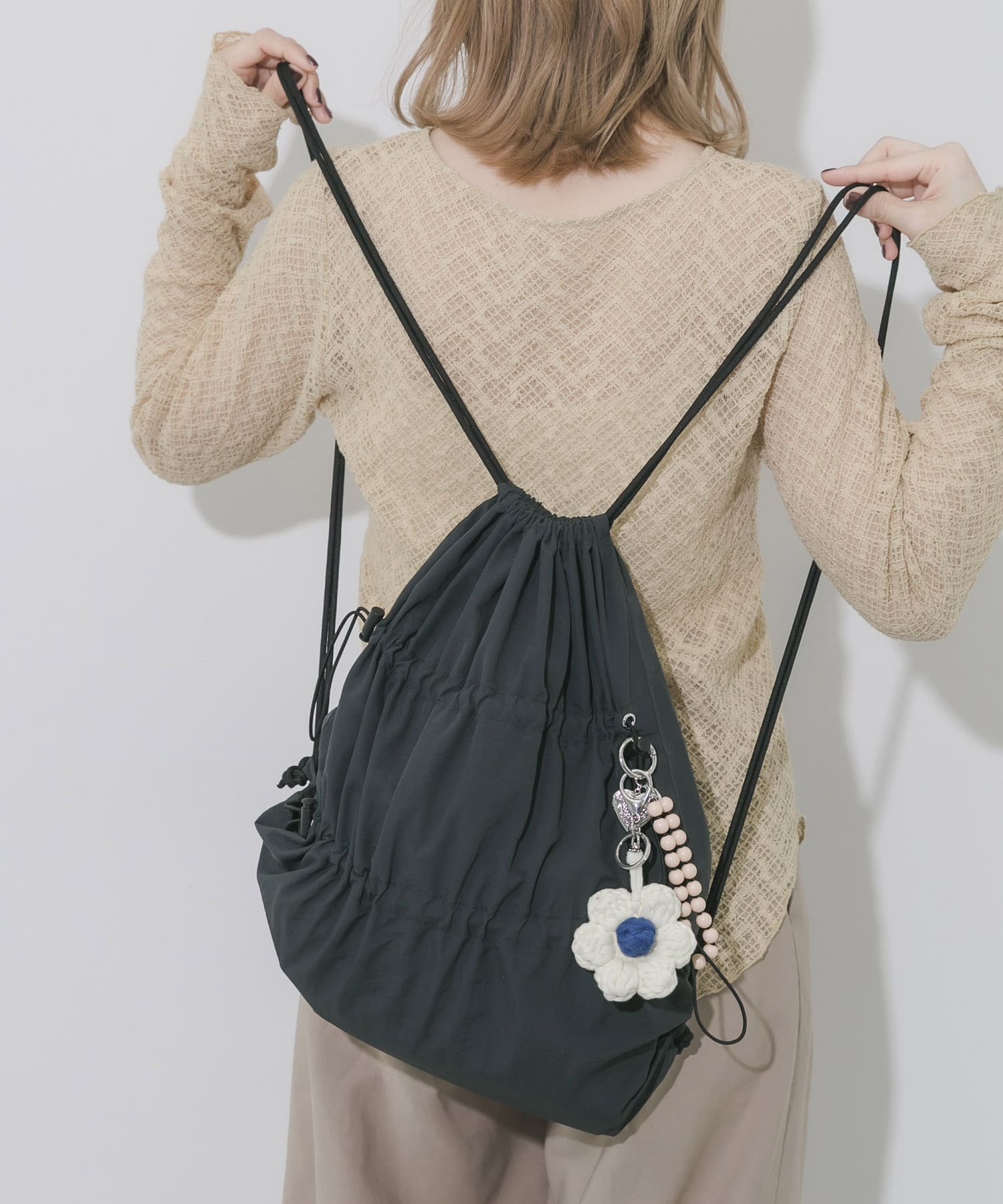 ドロストギャザーナップサック BLK -