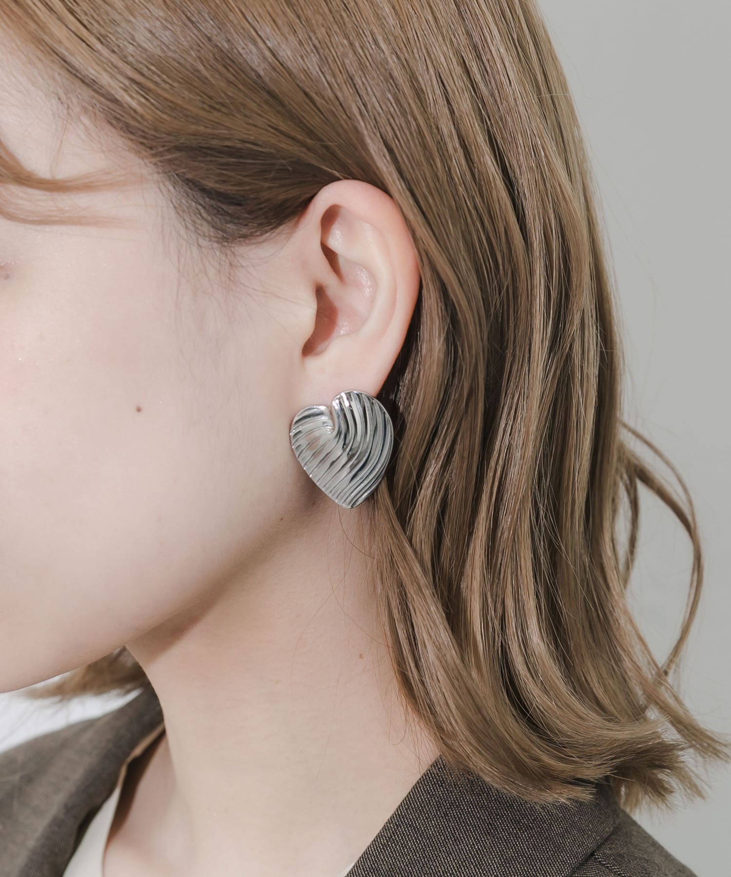 ステンレスウェーブラインハートピアス