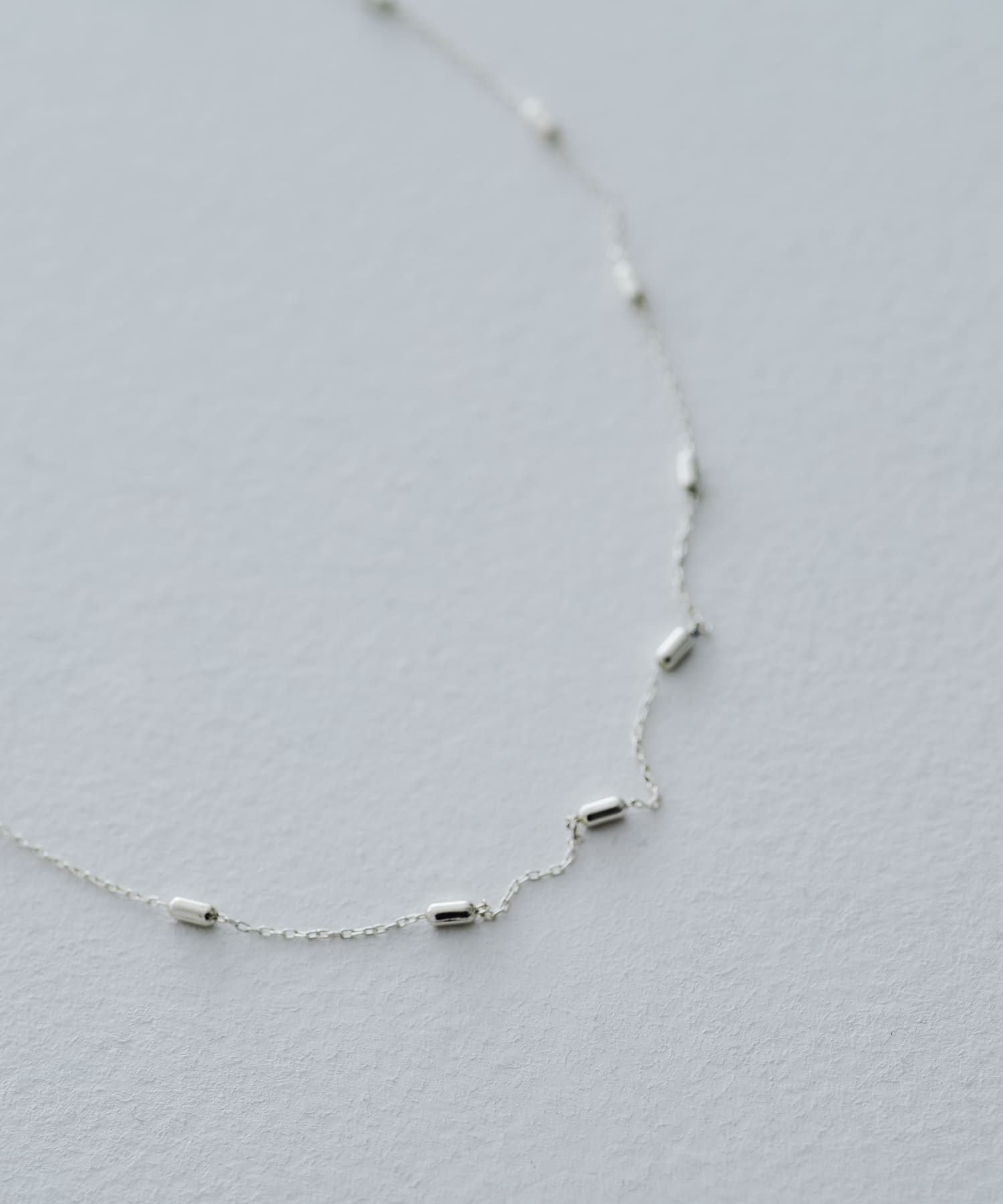 SMELLY so’　station chain necklace SLV -