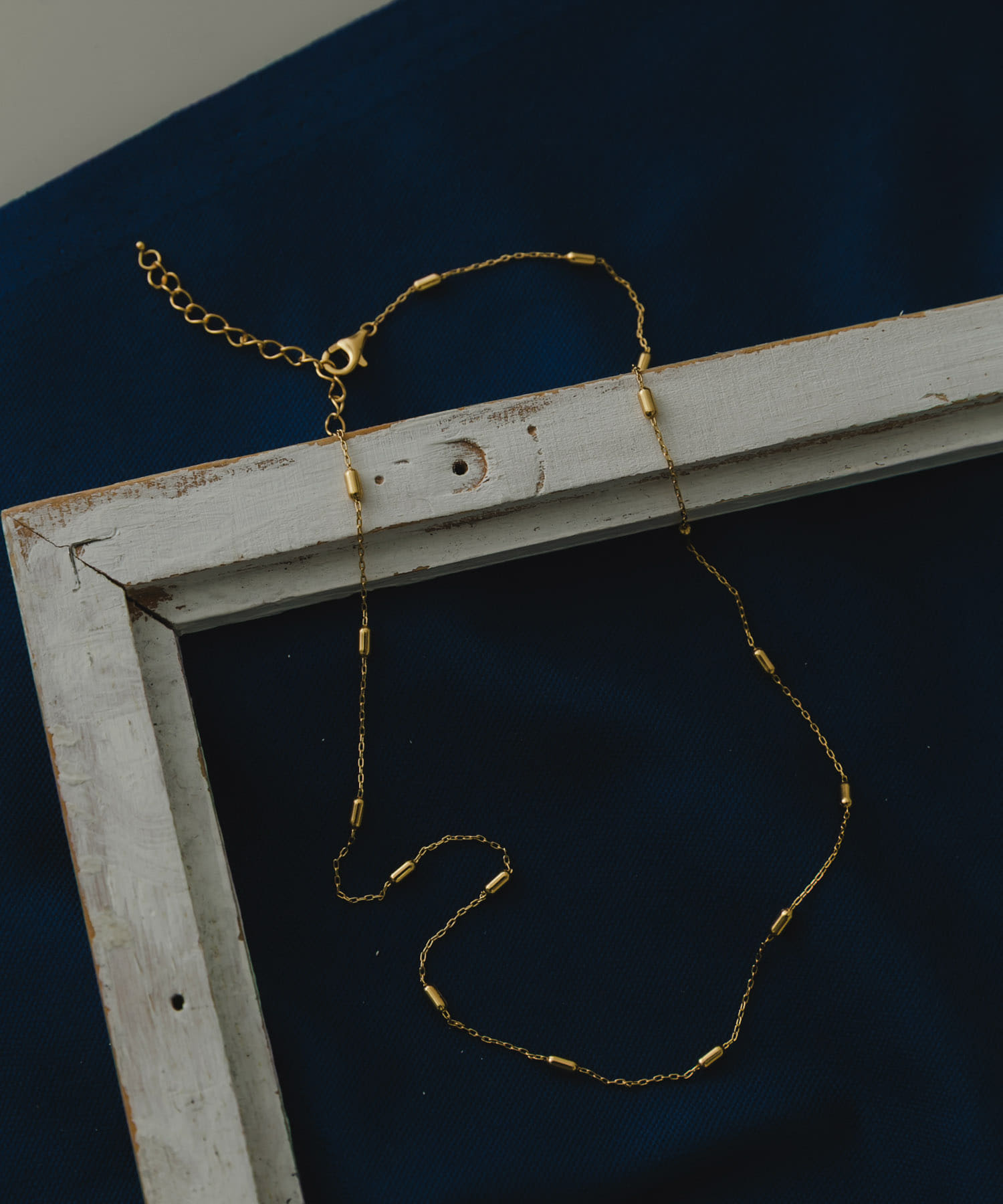 SMELLY so’　station chain necklace