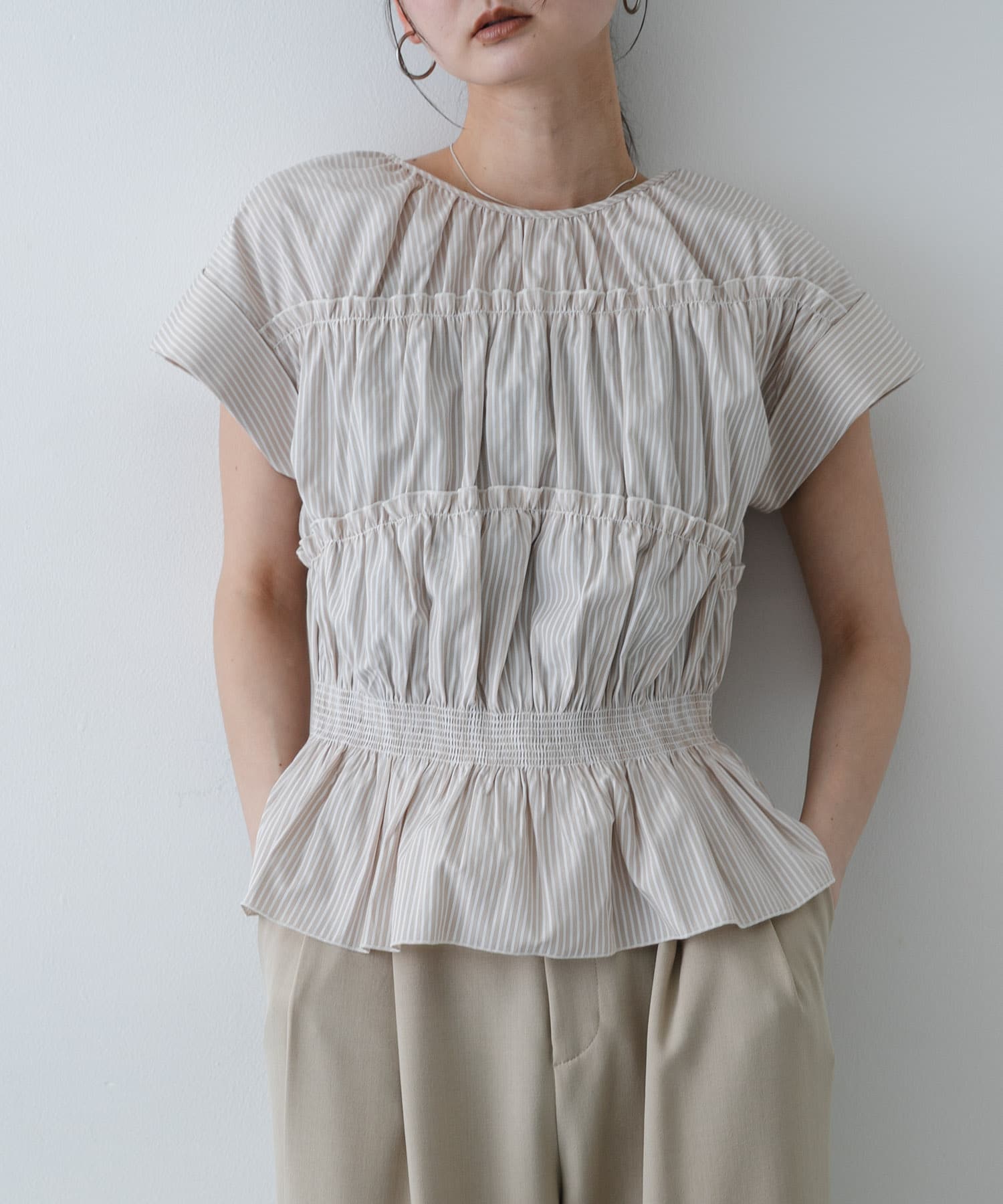 ロールアップシャーリングブラウス