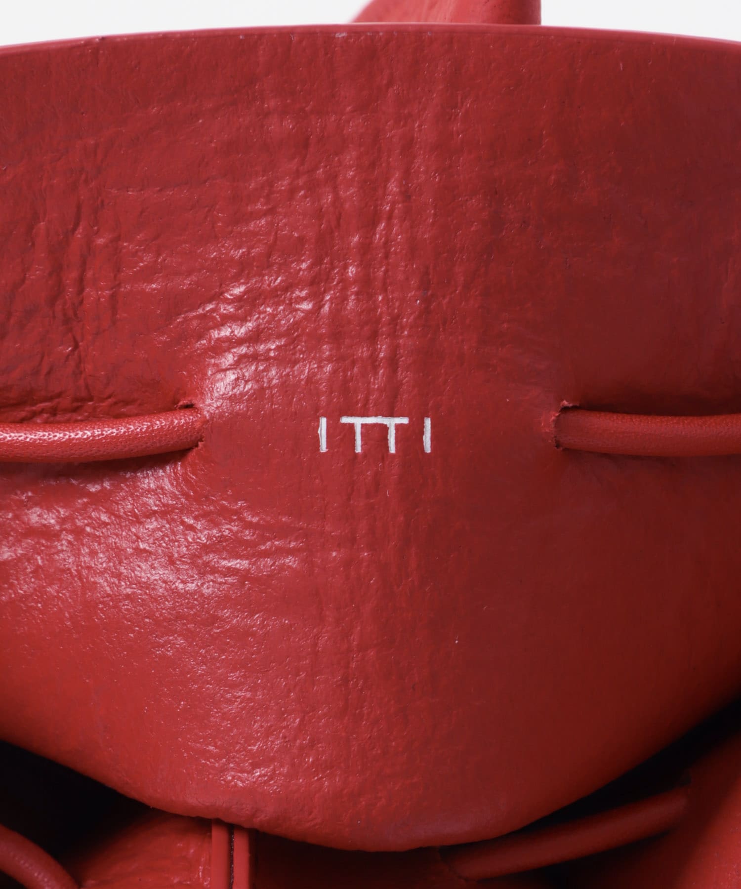『一部別注カラー』ITTI　HERRIE KINCHAKU POUCH 別注RED XXS