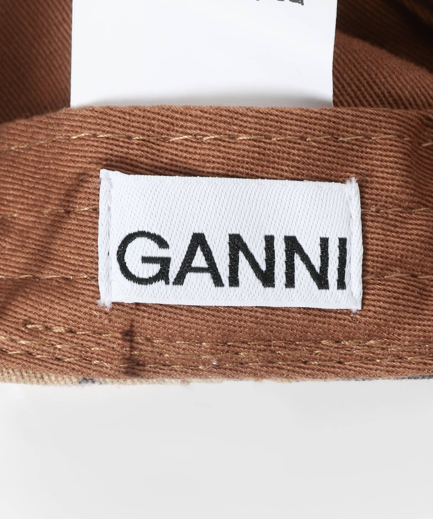 GANNI　PRINT CANVAS CAP ARGAN OIL -