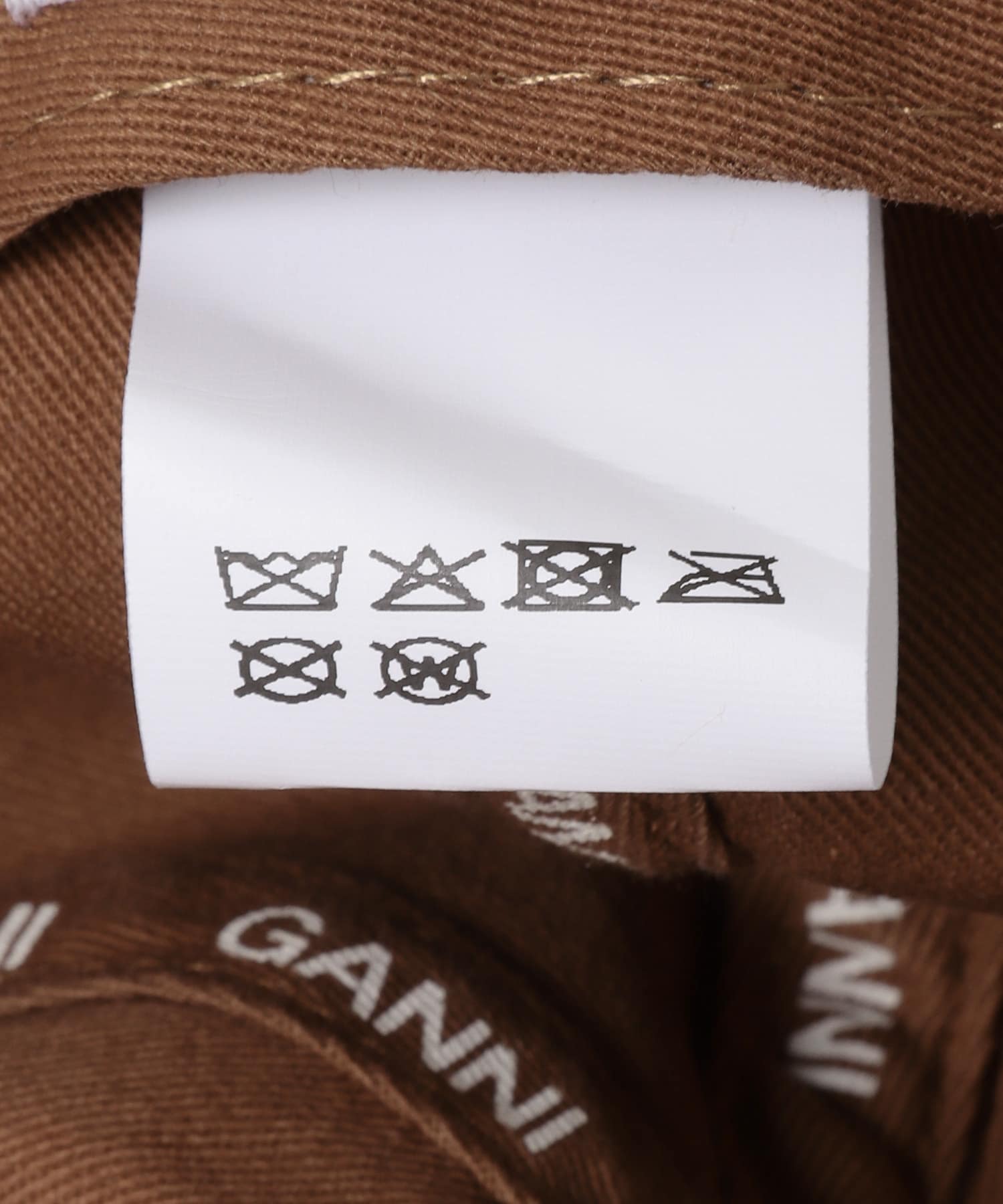 GANNI　PRINT CANVAS CAP ARGAN OIL -