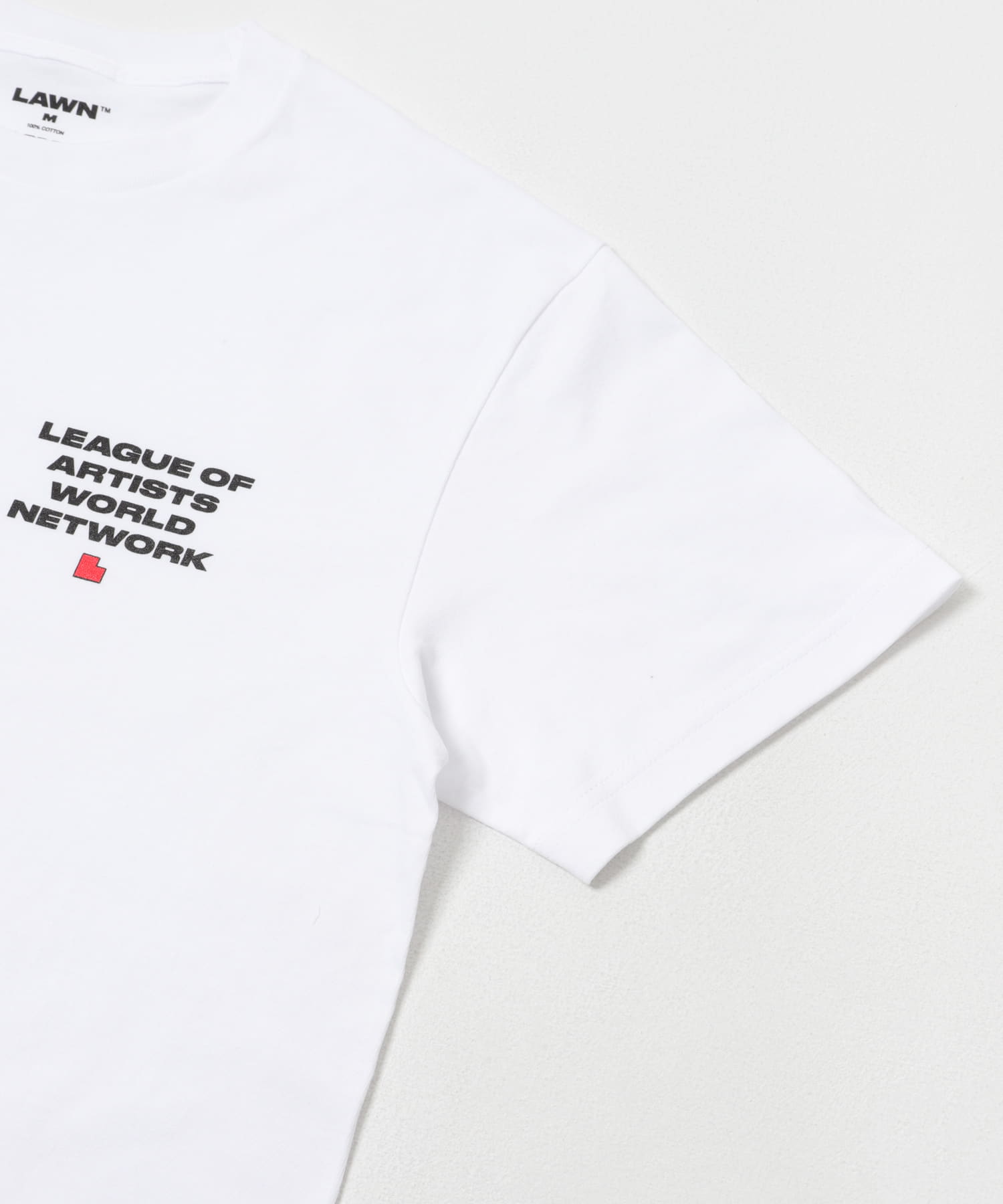 LAWN　EE LOGO PRINT SS TEE WHITE M