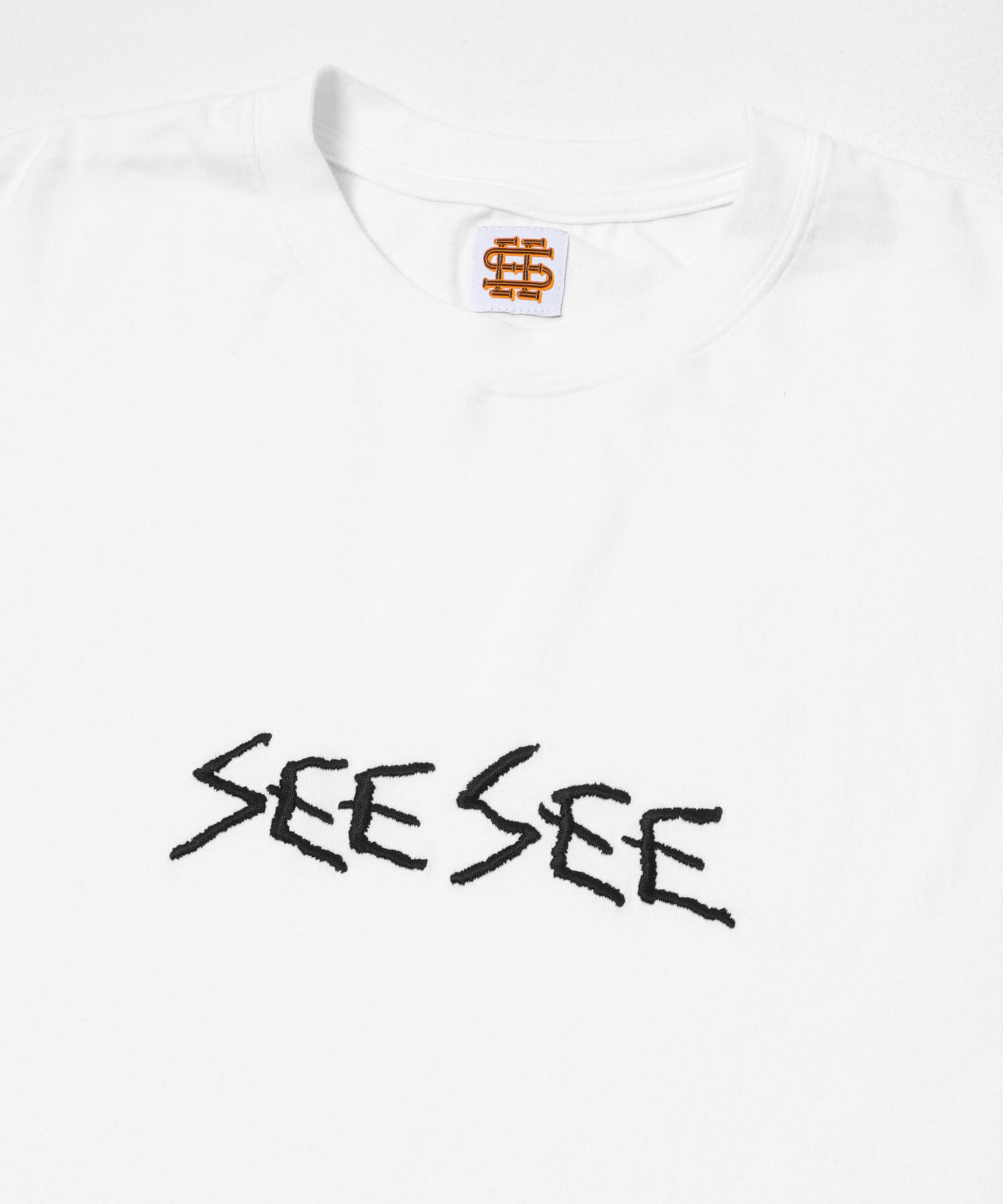 SEE SEE SUPER BIG CALLIGRAPHY TEE(M BLACK): トップス｜URBAN