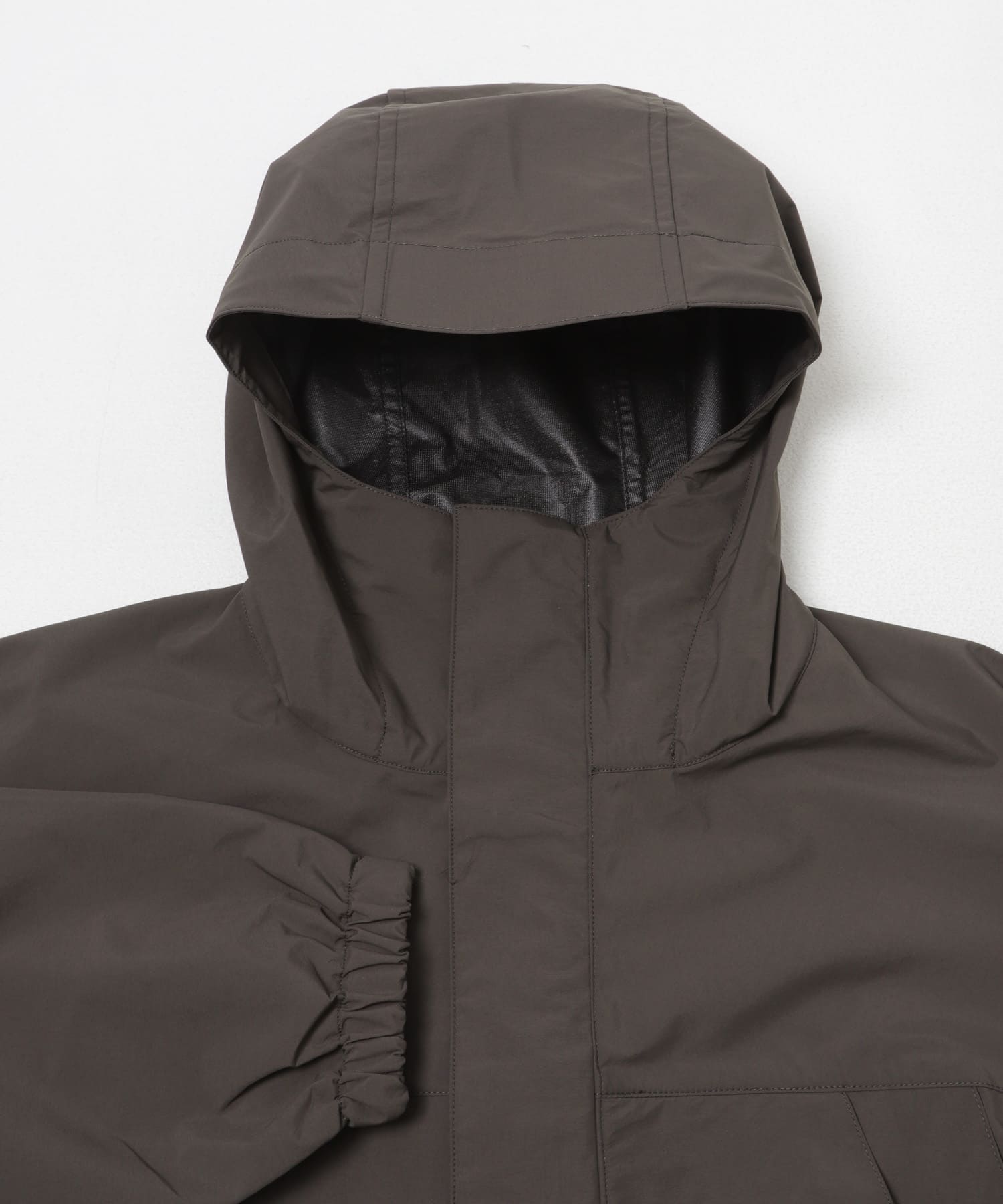 ES.U　NYLON WIND HOODIE D.BROWN L
