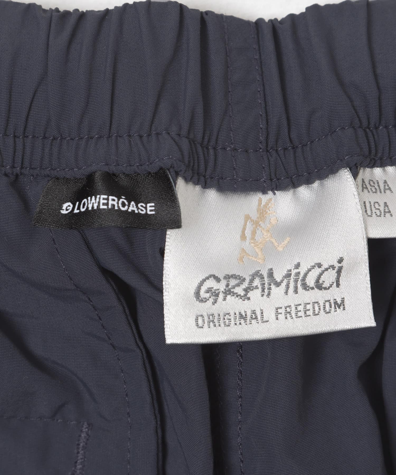 Gramicci / LOWERCASE　NYLON TRACK PANT NAVY S